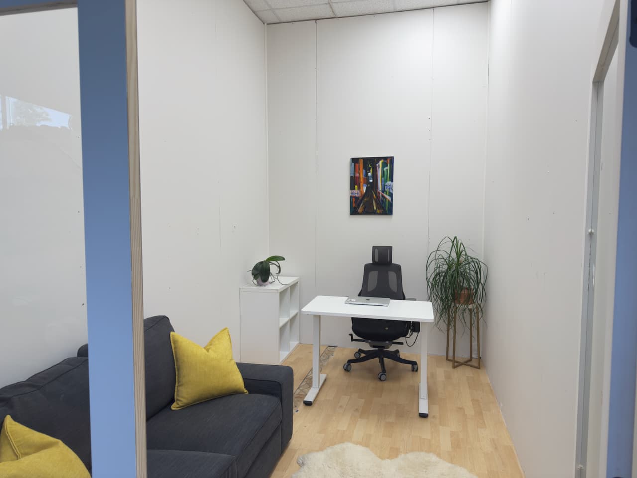 A beautifully compact office for two people. About 100sqft. Currently comes with a desk, and a comfy couch. Featuring glass double doors for extra light.