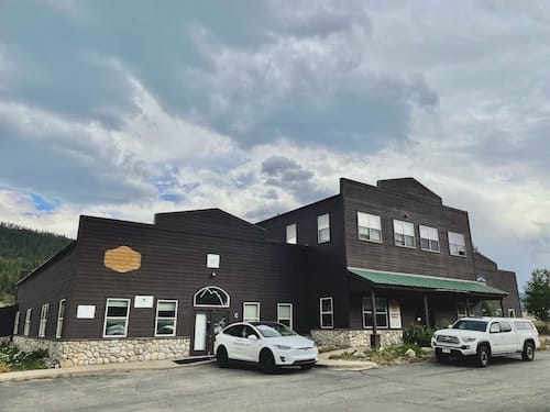 Free street parking available around the building on Airport Road. The free Grey Line bus stops right in front for easy access to downtown Breckenridge.