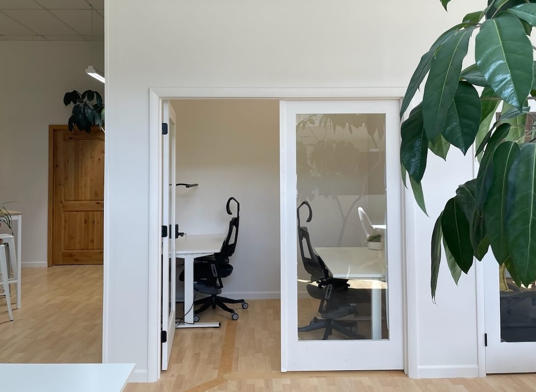Office B is located in the space with a lot of windows and thus gets lots of natural light. Perfect if light is something you cherish. Setup for one right now, but fits two perfectly. 