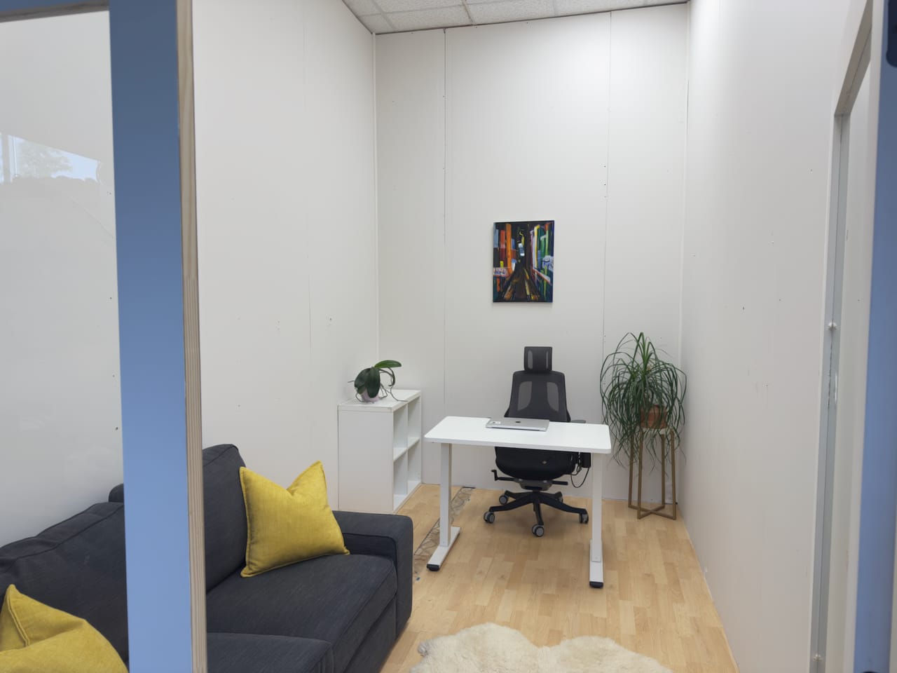 A beautifully compact office for two people. About 100sqft. Currently comes with a desk, and a comfy couch. Featuring glass double doors for extra light.